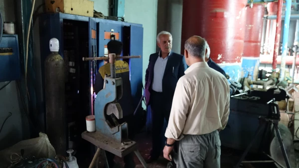 بازدید دکتر معروفی از مراحل نصب تأسیسات سیستم گرمایشی موتورخانه مرکزی پردیس شهید مدرس 3