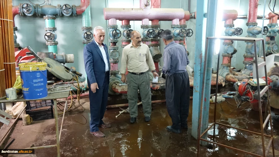 بازدید دکتر معروفی از مراحل نصب تأسیسات سیستم گرمایشی موتورخانه مرکزی پردیس شهید مدرس 4